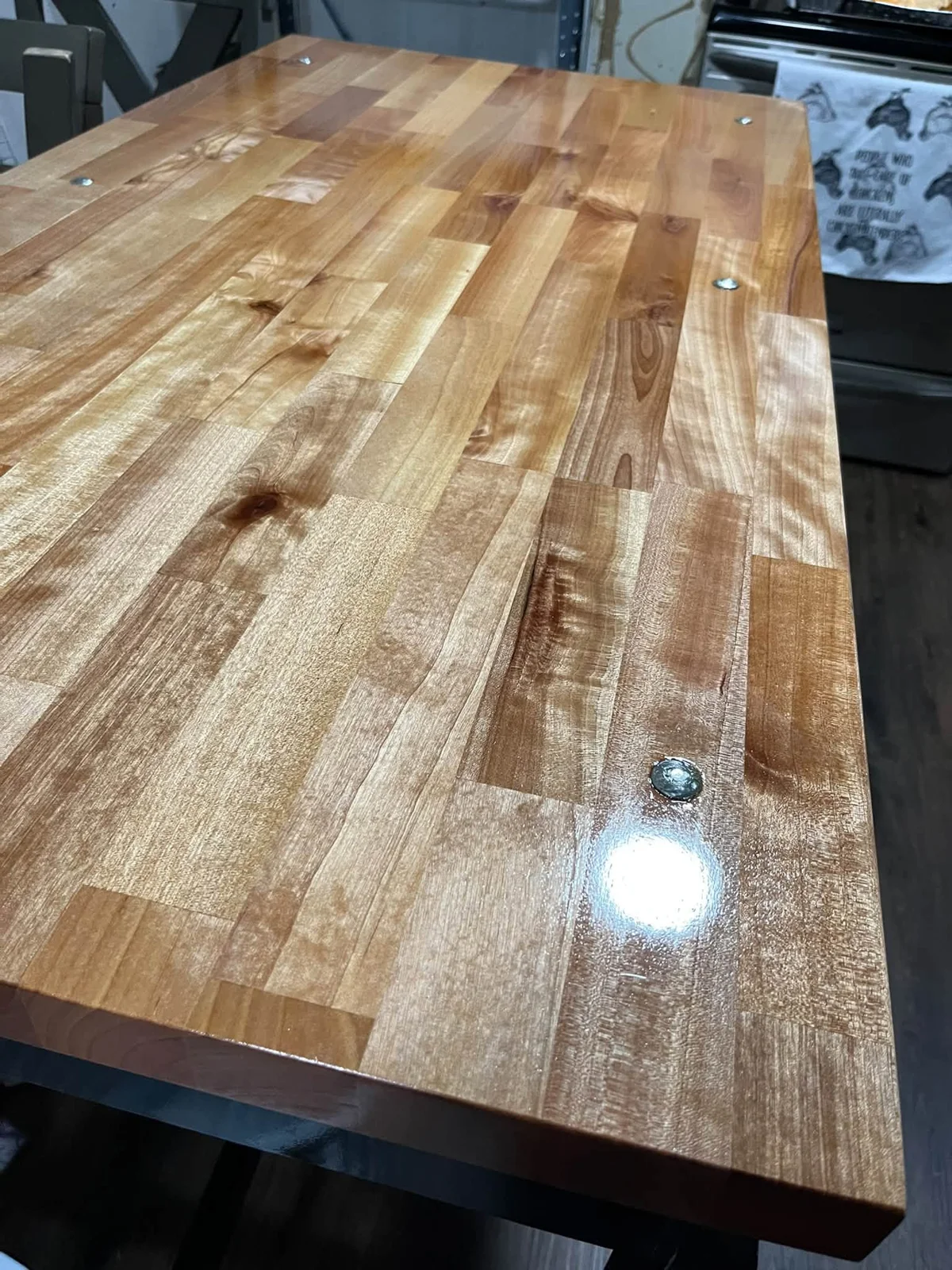 Woodwork detail showing the grain of a finished tabletop